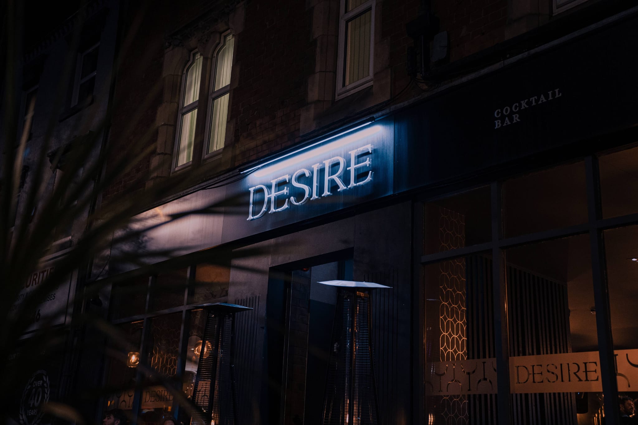 Exterior sign at Desire Cocktail Bar